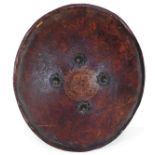 An 18th/19thC. shield, possibly Persian, leather w