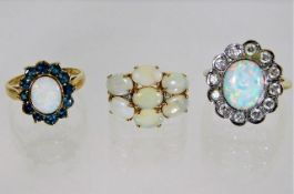 Three 9ct gold rings with opal style stones 12g