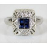 A 14ct white gold diamond & sapphire ring 3.6g siz