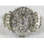 A 9ct white gold diamond cluster ring 4.5g size O