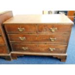 A Georgian oak chest of drawers with brass fitting