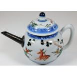An 18thC. Chinese teapot with later spout & hairli