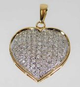 A 9ct gold heart shaped pendant set with 1ct diamo