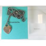 A boxed Tiffany & Co. silver chain & pendant set 3