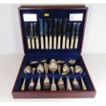 A cased mixed cutlery set with six silver spoons 1