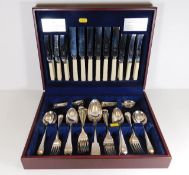 A cased mixed cutlery set with six silver spoons 1