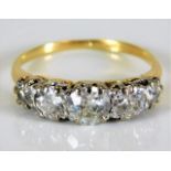 An 18ct five stone diamond ring 2.7g approx. 1.4ct