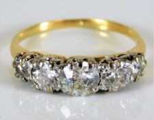 An 18ct five stone diamond ring 2.7g approx. 1.4ct