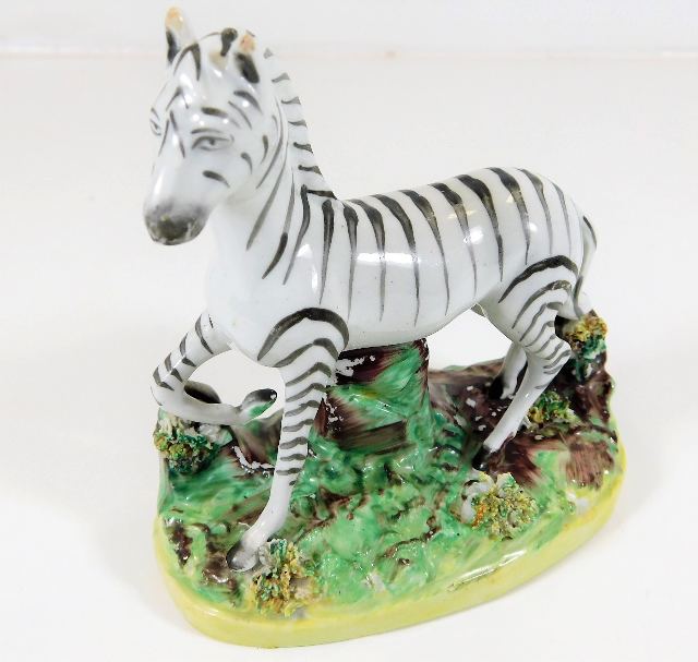 An early 19thC. Staffordshire zebra 4.75in tall