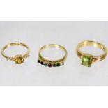 Three 9ct gold rings set with mixed stones 8.9g