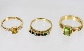 Three 9ct gold rings set with mixed stones 8.9g