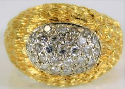 An 18ct gold ring set with diamond 11.2g size N