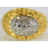 An 18ct gold ring set with diamond 11.2g size N