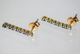 A pair of 9ct gold earrings set with diamond 1.6g