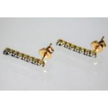 A pair of 9ct gold earrings set with diamond 1.6g