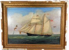 A framed oil of sail ship at sea in gilt frame tit