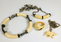 A set of ivory & white metal jewellery items