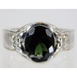 A 9ct white gold tourmaline & diamond ring 4.5g si