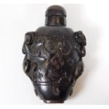 A 19thC. carved rhino horn Chinese scent bottle