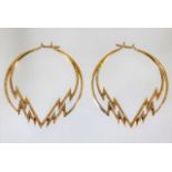 A pair of 18ct gold earrings set with approx. 3ct