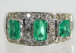 A 14ct white gold emerald ring set with approx. 0.