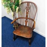 A c.1800 elm stick back Windsor chair with crinoli