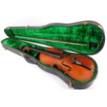 A vintage violin a/f set within plush lined case
