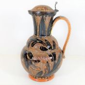 A Royal Doulton stoneware jug & cover 8.5in tall