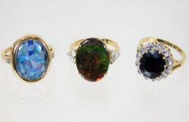 Three 9ct gold rings with mixed stones 12.5g