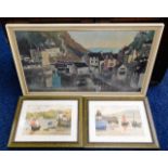 A framed print of Tom Morton's "Polperro From the