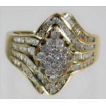 A 9ct gold ring set with diamonds 4.2g size S