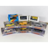 Nine boxed diecast toy cars including Matchbox, Co