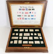 A cased set of twenty five silver proof ingot Stam