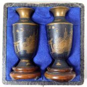 A pair of Chinese brass vases with lacquer decor &