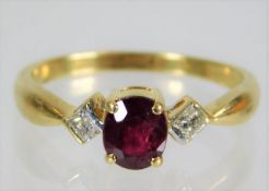 An 18ct gold ruby & diamond ring 2.9g size O