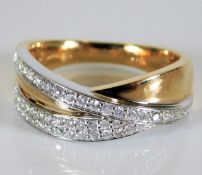 A 14ct two colour gold ring set with over forty di
