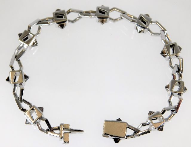 A Stephen Webster for De Beers 18ct white gold "Barbed Wire" bracelet set with approx. 40ct rough cu