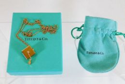 A Tiffany 18ct gold graduation necklace & mortarbo