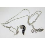 A 9ct white gold pendant & chain with black & whit