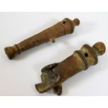 Two 18thC. toy cannons, one shown exploded