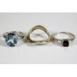 Three silver fashion rings