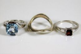 Three silver fashion rings