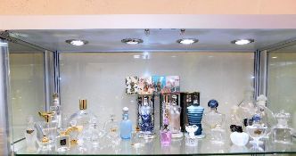 A quantity of perfume bottles including Gaultier,