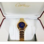 A fine ladies Cartier 18ct gold quartz blue dial w