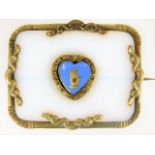 A Victorian brooch with enamelled Shaker heart in