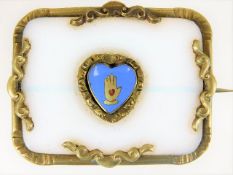 A Victorian brooch with enamelled Shaker heart in