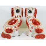 A pair of Victorian Staffordshire spaniel dogs 10i