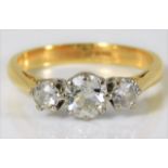 An 18ct gold diamond trilogy ring with approx. 1.1