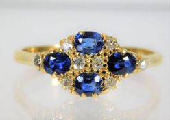 An 18ct gold diamond & sapphire ring 3.6g size T
