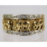 A 9ct gold ring with elephant decor set with diamo